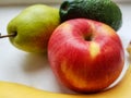 Apple, avocado, banana and pear Royalty Free Stock Photo