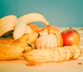 Apple, Bananas, mandarines on table Royalty Free Stock Photo