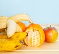 Apple, Bananas, mandarines on table Royalty Free Stock Photo