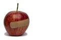 An Apple With A Bandage Royalty Free Stock Photo