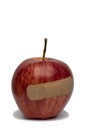 An Apple With A Bandage Royalty Free Stock Photo