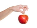 Apple in a beautiful female hand Royalty Free Stock Photo