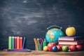 Apple, Books, Pencils, and Globe on Table - Education and Knowledge Concept, School supplies with a chalkboard, back to school