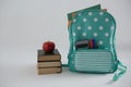 Apple, books and schoolbag on white background Royalty Free Stock Photo