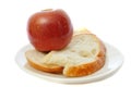 Apple with bread on plate Royalty Free Stock Photo