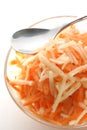 Apple and carrot salad in a glass bowl Royalty Free Stock Photo