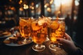 Apple Cider Cheers Friends clinking mugs of apple cider - stock photo concepts