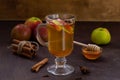 Apple cider with fresh apples and honey. Hot fruit tea with spices Royalty Free Stock Photo