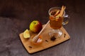 Apple cider with fresh apples and honey. Hot fruit tea with spices Royalty Free Stock Photo
