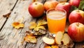 Apple cider and fruit on wooden background Royalty Free Stock Photo