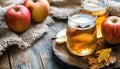 Apple cider and fruit on wooden background Royalty Free Stock Photo