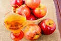 Apple cider glass and red apples Royalty Free Stock Photo