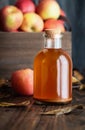 Apple Cider Vinegar with a Box of Fresh Apples Royalty Free Stock Photo