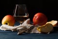 Apple cider in wine glass with cinnamon sticks and fresh apples Royalty Free Stock Photo