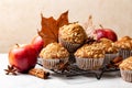 Apple cinnamon streusel muffins. Autumn pastry background.
