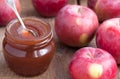 Apple confiture in Glass Jar with apples on the wooden table Royalty Free Stock Photo