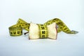 Apple core with measuring tape Royalty Free Stock Photo