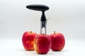 Apple corer. Tool for removing the apple core on white background Royalty Free Stock Photo