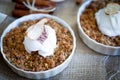 Apple Crumble Dessert With Cinnamon And Vanilla Ice Cream On Wooden Background Royalty Free Stock Photo