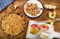 Apple Crumble Dessert on rustic wooden board.