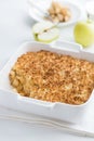 Apple crumble pie in white baking dish Royalty Free Stock Photo