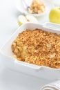 Apple crumble pie in white baking dish Royalty Free Stock Photo
