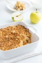 Apple crumble pie in white baking dish Royalty Free Stock Photo