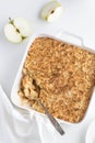 Apple crumble pie in white baking dish Royalty Free Stock Photo