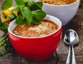 Apple crumble in two cups on wooden rustic background. Royalty Free Stock Photo