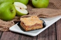 Apple Crumbles Tart Served in a dish side view on grey background Royalty Free Stock Photo