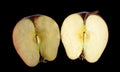 Apple cut in half isolated on black background Royalty Free Stock Photo