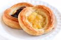 Apple Danish and Blueberry Danish on White Plate Royalty Free Stock Photo