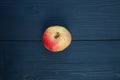 Apple on dark wooden background