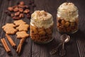 Apple dessert in glasses with cinnamon, walnut, gingerbread and mascarpone. Royalty Free Stock Photo