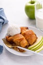 Apple dumplings in flaky pastry with caramel sauce