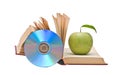 Apple, dvd, and books Royalty Free Stock Photo