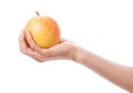 Apple in a female hand Royalty Free Stock Photo