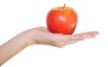 Apple on a female palm Royalty Free Stock Photo