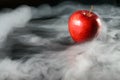 Apple in fragrant smoke