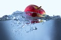 Apple fresh red splash into the water,red fruit Royalty Free Stock Photo