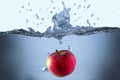 Apple fresh red splash into the water,red fruit Royalty Free Stock Photo