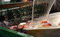 Fruit processing factory. Apple cleaning process on a water conveyor belt. Fruit washing and sorting Royalty Free Stock Photo