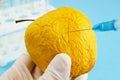 apple in genetic engineering laboratory with syringe and test Royalty Free Stock Photo