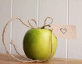 Apple gift from the heart Royalty Free Stock Photo