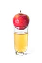 Apple in glass of juice Royalty Free Stock Photo