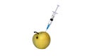 Apple pricked with a syringe on a white isolated background. Royalty Free Stock Photo