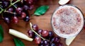 Apple-grapes drink on wooden parquet Royalty Free Stock Photo