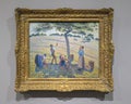 Apple Harvest by Camille Pissarro on display in the Dallas Museum of Art.