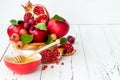 Apple and honey, traditional food of jewish New Year - Rosh Hashana. Copy space background.