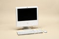 Apple iMac 17 inches 2006 isolated on beige Royalty Free Stock Photo